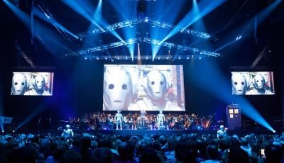 Cybermen invade the Doctor Who Symphonic Spectacular tour while Ben Foster conducts the BBC National Orchestra of Wales and the BBC National Chorus of Wales. (Credit: House PR)