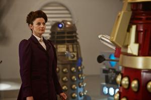 The Witch's Familar: Michelle Gomez as Missy with the Daleks (Credit: BBC/Simon Ridgway)