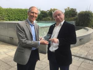 Philip Hinchcliffe receives an award from Jeremy Bentham (Credit: Nick Salmond / News in Time and Space Ltd)