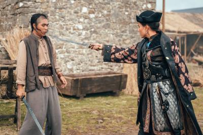 Ying Ki (MARLOW CHAN-REEVES), Madam Ching (CRYSTAL YU) (Credit: BBC Studios/James Pardon)